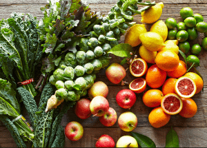 a group of fruits and vegetables on a wood surface Healthy Weight Loss Diets Cirencester